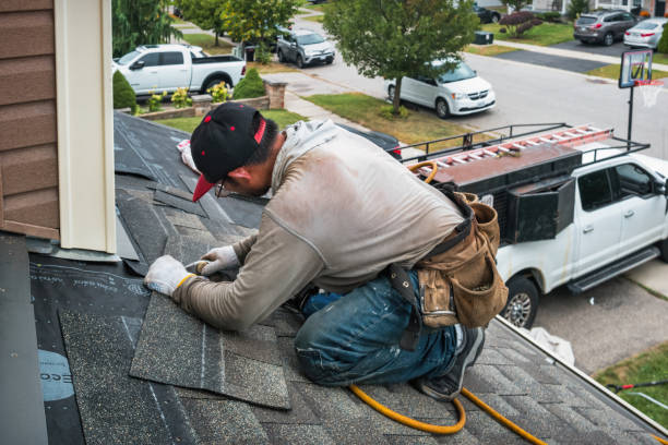 Professional Storm Damage Roof Repair technician working in Leland, NC